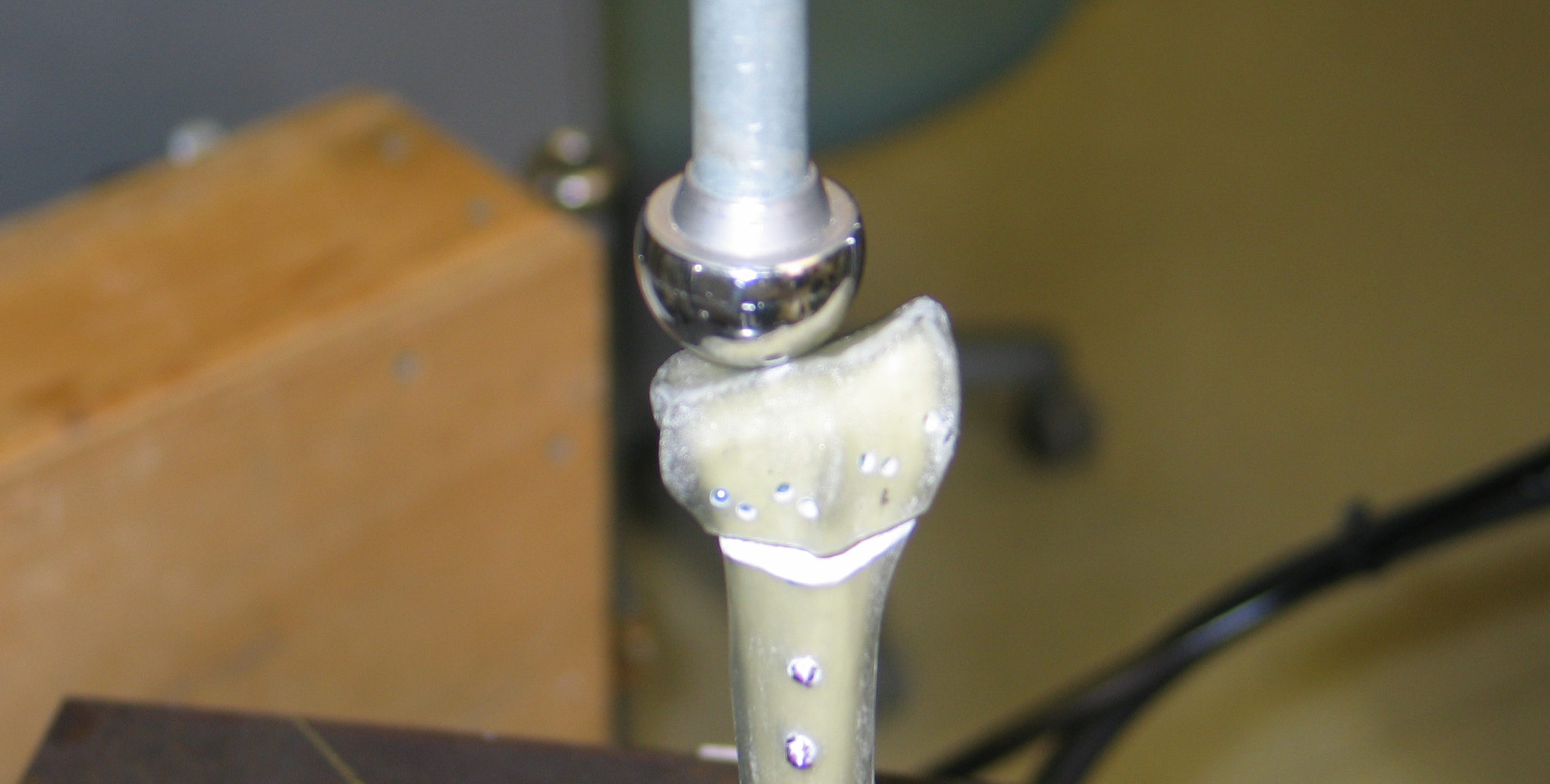 Lab machinery testing joint mechanics with the use of implants.