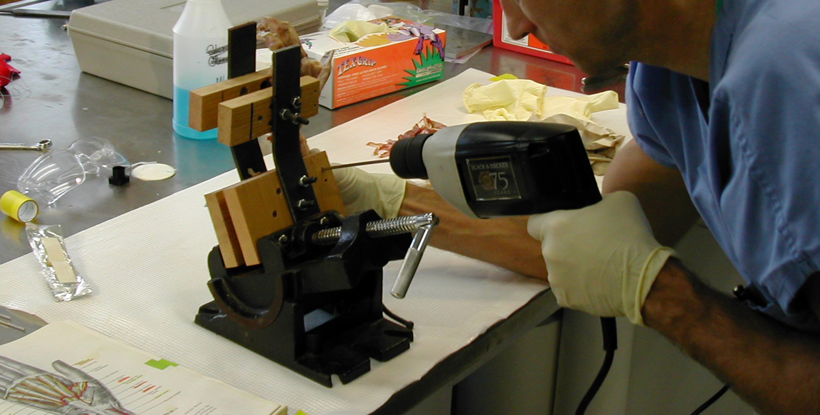 An image of a researcher building a prototype mount for testing implants.